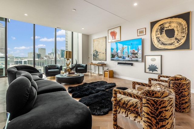 living room with expansive windows and light parquet floors