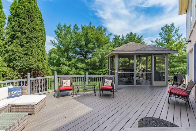 deck featuring a sunroom