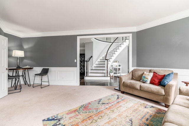 living room with crown molding and carpet floors