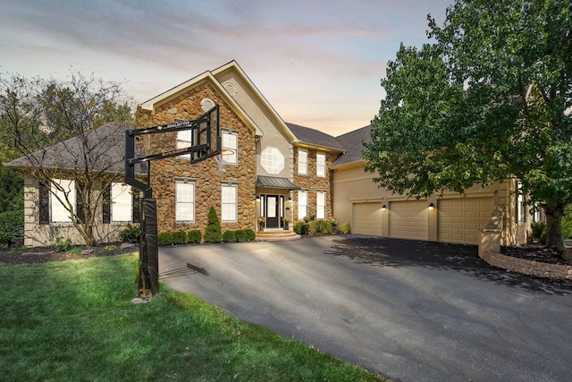 view of front of property featuring a garage