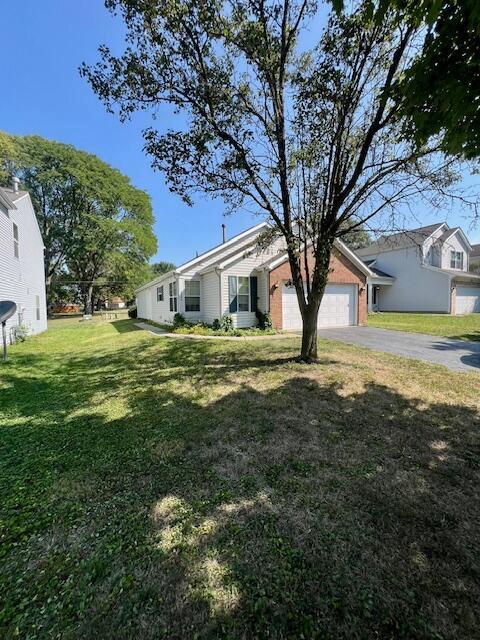 view of yard with a garage