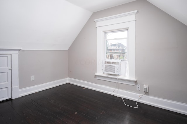 bonus room with cooling unit, wood-type flooring, and lofted ceiling