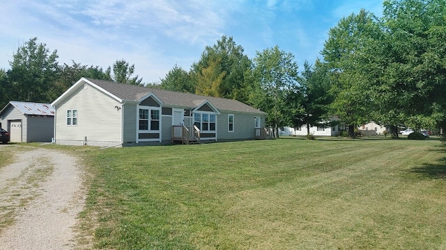 view of front of home featuring a front yard