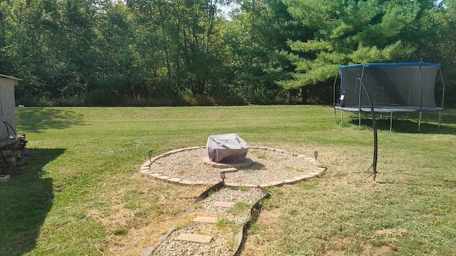 view of yard featuring a trampoline