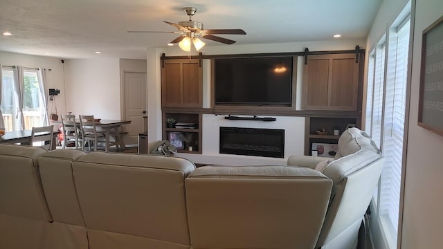 living room with ceiling fan