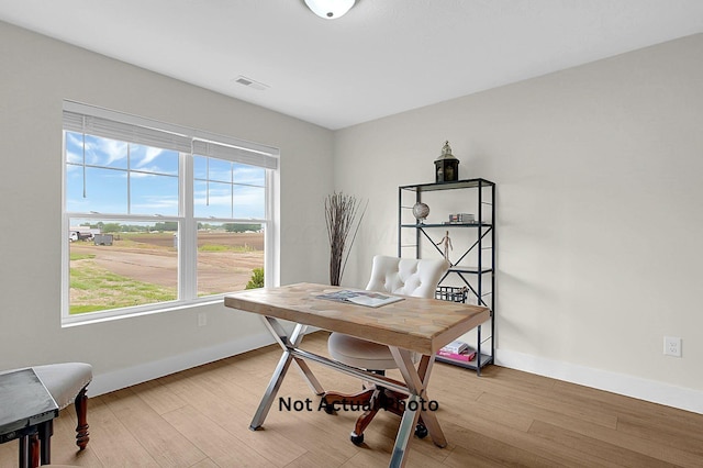 102 Cumberland Meadows Cir, Hebron, OH 43025 - home office with baseboards and light wood-style flooring
