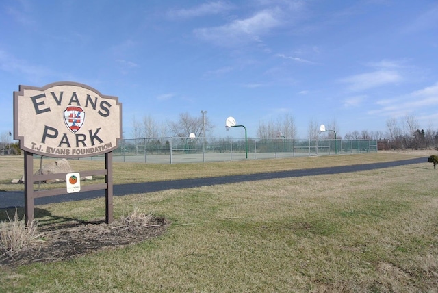 view of home's community with a lawn