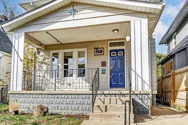 entrance to property with covered porch