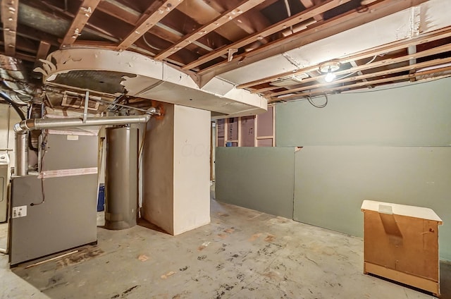 basement with heating unit and water heater