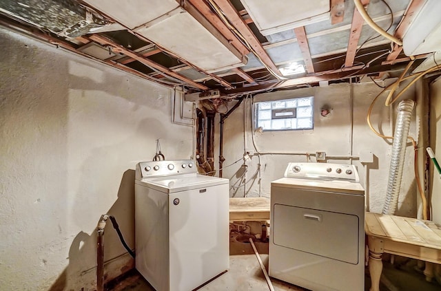 laundry area with separate washer and dryer