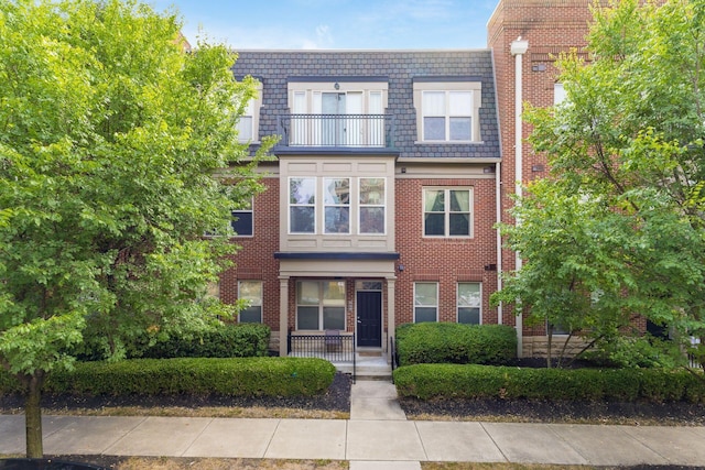 view of property featuring a balcony