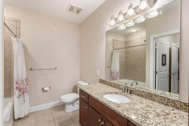 full bathroom featuring tile patterned floors, vanity, toilet, and shower / tub combo