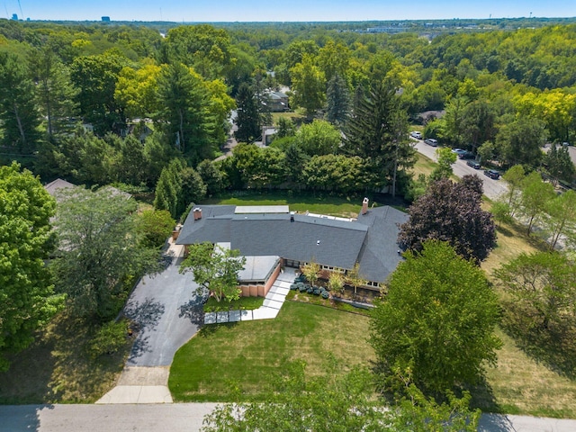 aerial view featuring a view of trees