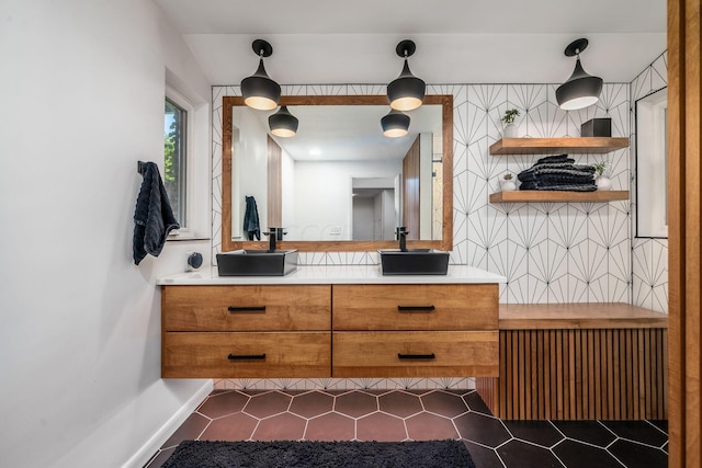 full bath featuring double vanity and a sink