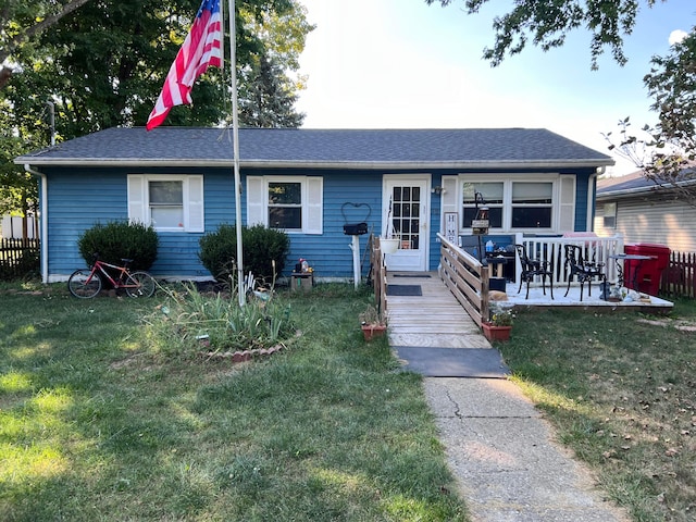 ranch-style home with a front yard