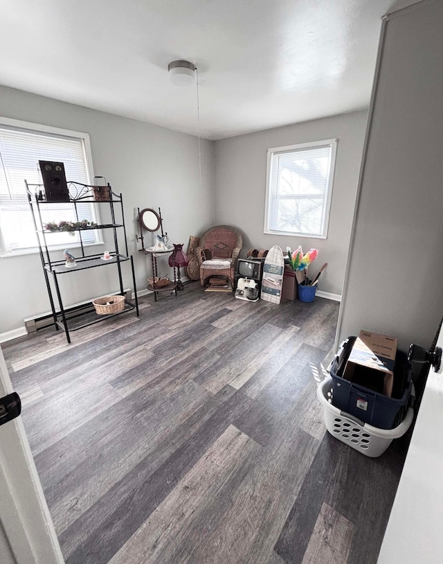 living area with hardwood / wood-style flooring