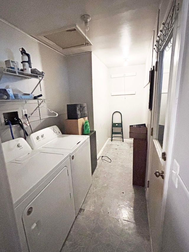 laundry room with washer and dryer