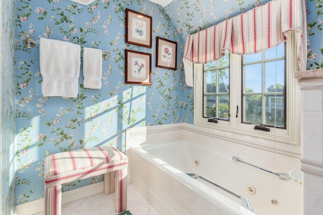 bathroom featuring tile patterned flooring and a bathtub