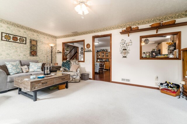 5595 Lancaster Rd, Hebron, OH 43025 - carpeted living room with a textured ceiling