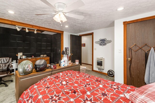 5595 Lancaster Rd, Hebron, OH 43025 - bedroom with carpet flooring, a textured ceiling, heating unit, ceiling fan, and a closet