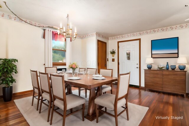 5595 Lancaster Rd, Hebron, OH 43025 - dining area featuring dark hardwood / wood-style floors and an inviting chandelier