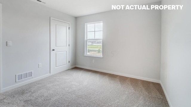 unfurnished room with carpet