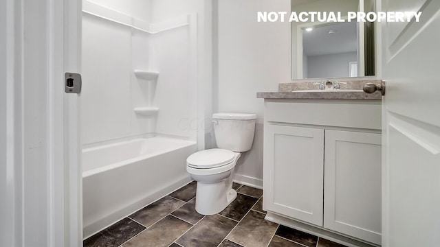 full bathroom with vanity, toilet, and shower / washtub combination