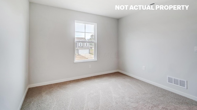 unfurnished room with carpet floors