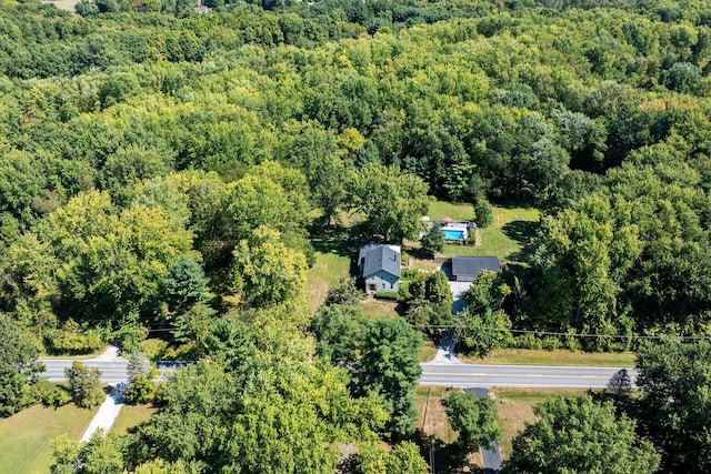 bird's eye view featuring a view of trees