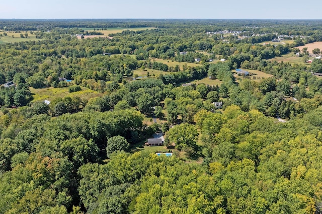 bird's eye view with a forest view