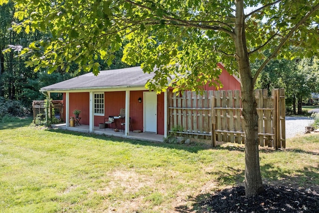 view of outdoor structure with fence