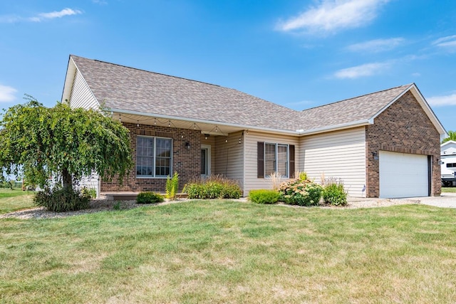 ranch-style home featuring a garage and a front yard