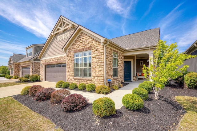 craftsman house with a garage