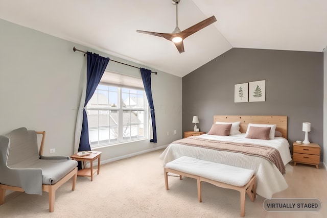 bedroom with carpet floors, ceiling fan, baseboards, and vaulted ceiling