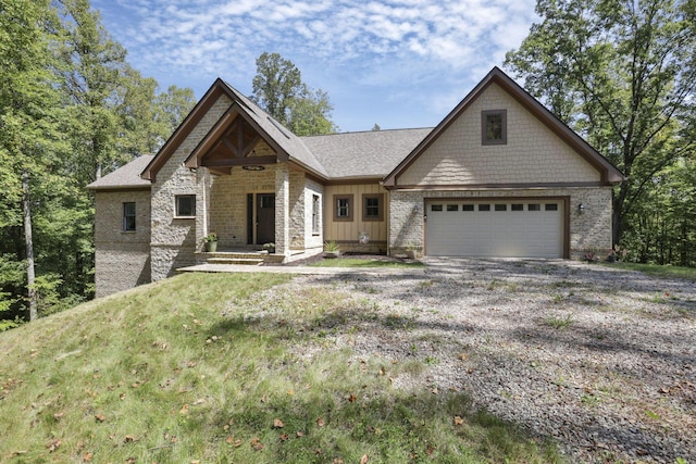 view of front facade featuring a garage and a front lawn