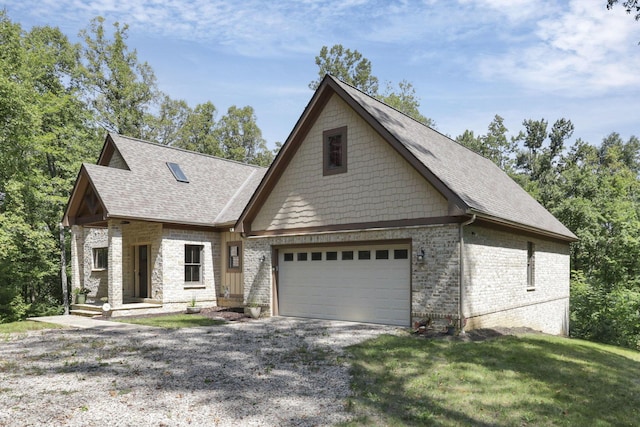 view of front facade featuring a garage and a front lawn