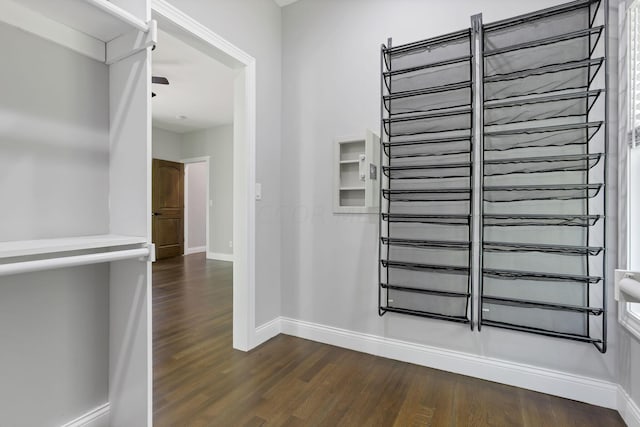 stairs with hardwood / wood-style floors