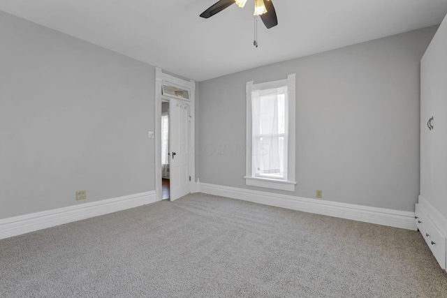 unfurnished bedroom featuring carpet floors and ceiling fan