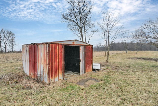 view of outbuilding featuring a rural view