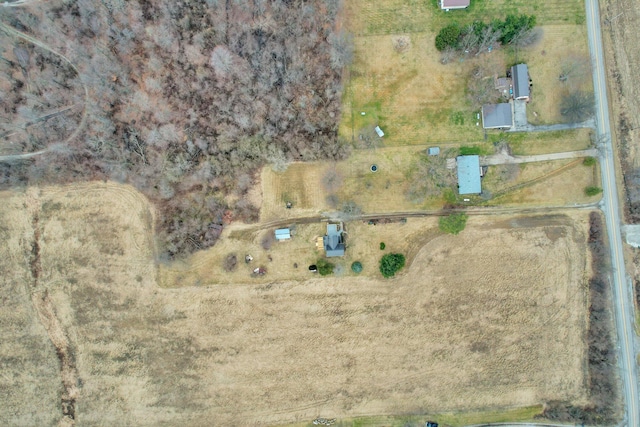 birds eye view of property featuring a rural view