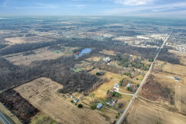 birds eye view of property featuring a rural view