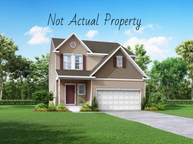 view of front of property with a front yard and a garage