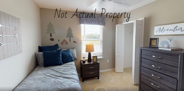 bedroom featuring light carpet