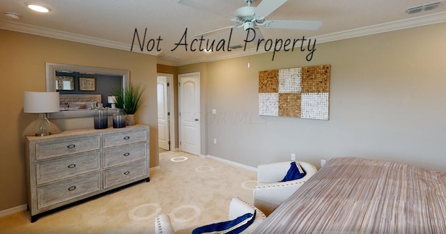 carpeted bedroom featuring ceiling fan and ornamental molding