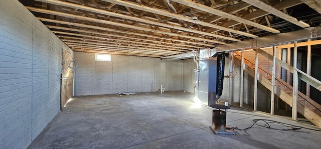 basement featuring heating unit