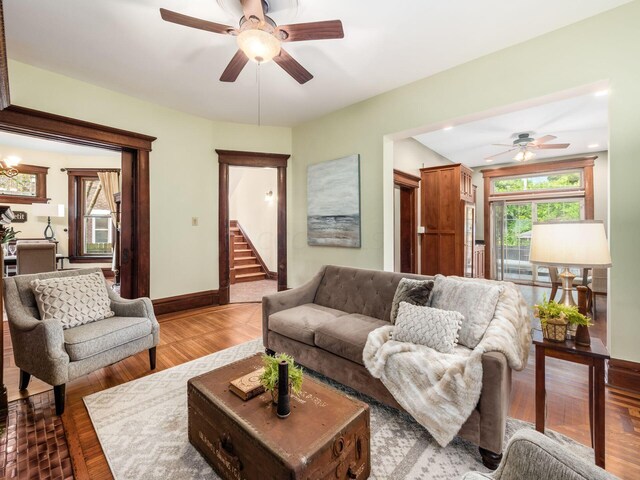 43 Winner Ave, Columbus, OH 43203 - living room featuring a ceiling fan, wood finished floors, and stairway