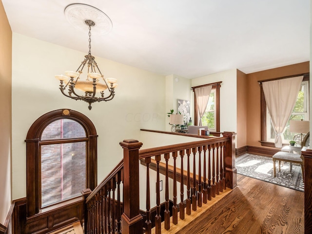 43 Winner Ave, Columbus, OH 43203 - stairway featuring a chandelier and wood finished floors