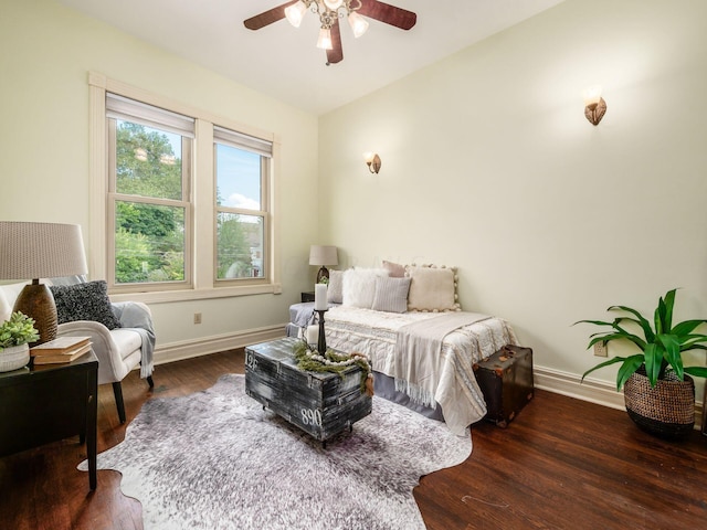 bedroom featuring ceiling fan and dark hardwood / wood-style floors