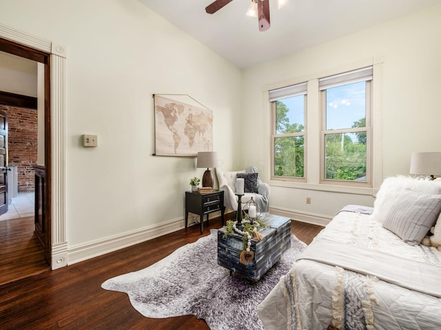 interior space with ceiling fan and dark hardwood / wood-style flooring