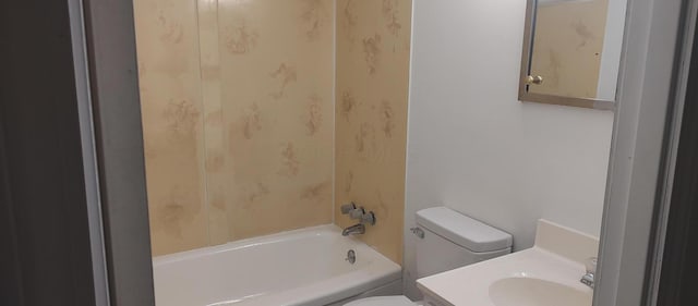 full bathroom featuring shower / bathing tub combination, toilet, and sink